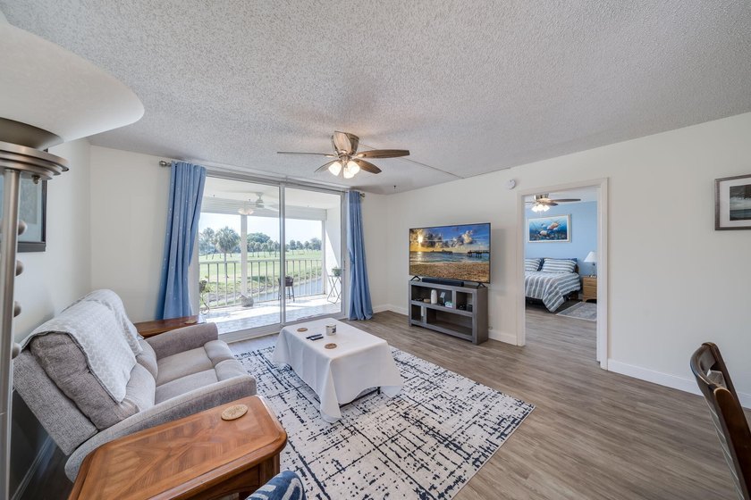 Nestled in a vibrant 55+ community, this completely remodeled in - photo 14