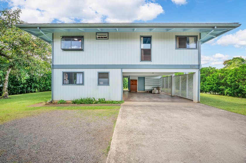 Nestled in the heart of Kilauea, this thoughtfully designed and - photo 6