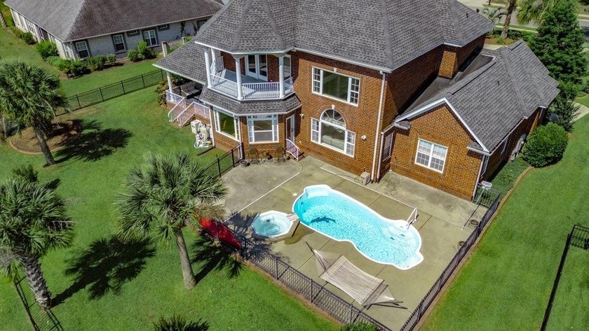 Luxury Waterfront Living with Private Pool in Plantation Lakes! - photo 18