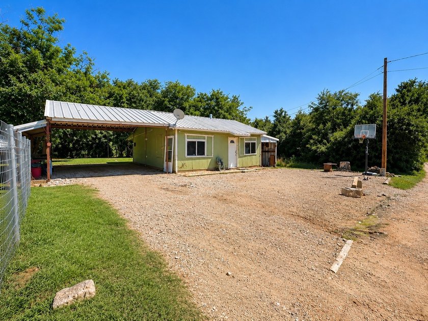 Welcome to this charming 2-bedroom, 1-bath home situated on a - photo 2