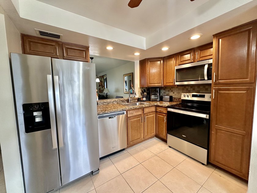 Welcome to this stunning turnkey 2 bed 2 bath property located - photo 2