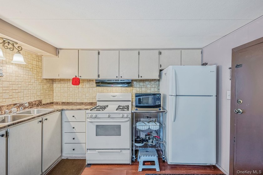 Charming 2-Bedroom Mobile Home in River Woods Welcome to this - photo 11