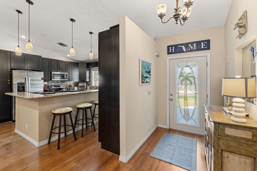 Situated on a spacious corner lot in Stuart's desirable Rocky - photo 3