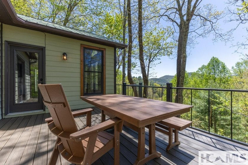 Nestled among the trees with sweeping mountain views, this - photo 15