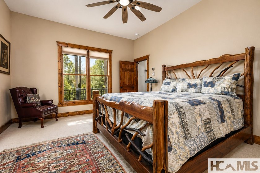 Nestled among the trees with sweeping mountain views, this - photo 16