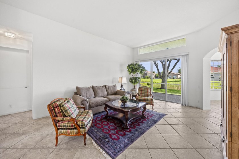 Lake views and sun-filled interiors create a warm, inviting - photo 5
