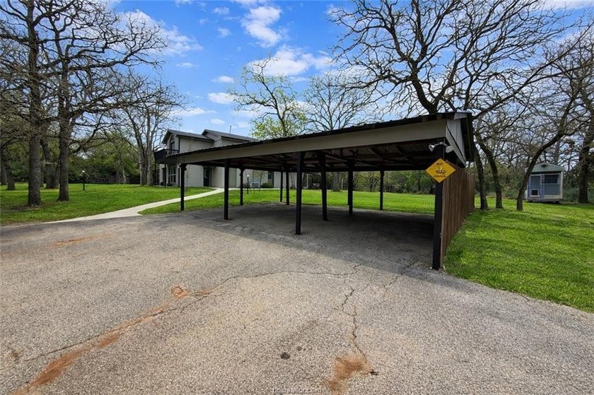 Set on nearly an acre of land, this one-of-a-kind property - photo 11