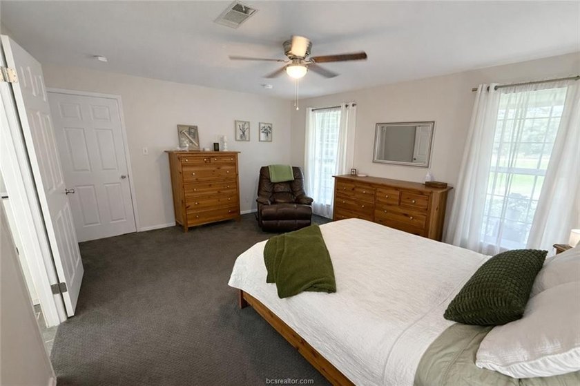 Set on nearly an acre of land, this one-of-a-kind property - photo 17