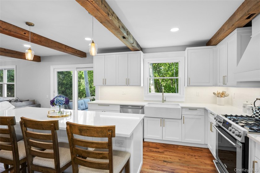 Nestled at the end of a long driveway, off Nassau Road, this - photo 17