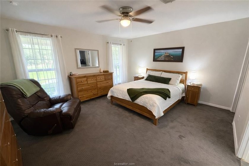Set on nearly an acre of land, this one-of-a-kind property - photo 18