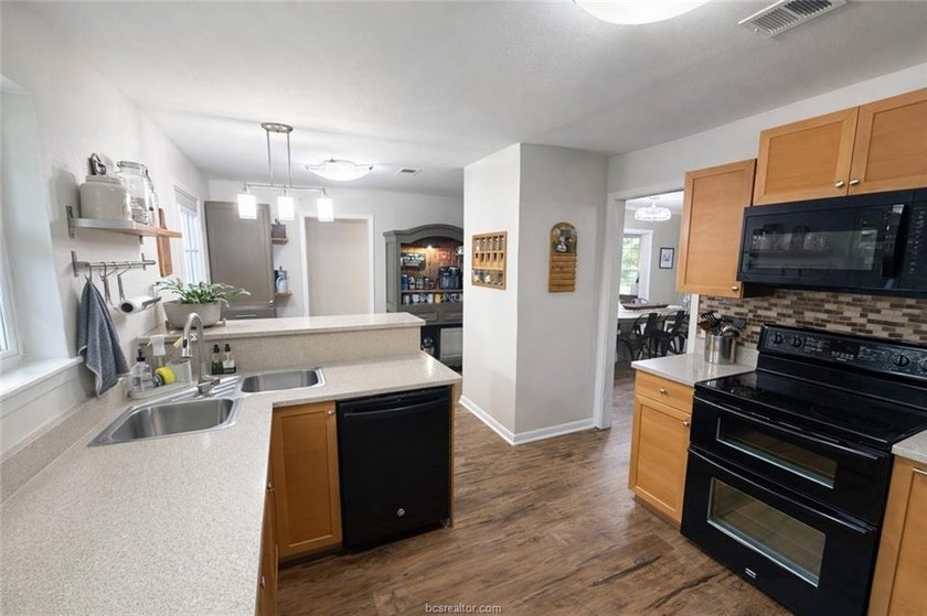 Set on nearly an acre of land, this one-of-a-kind property - photo 22