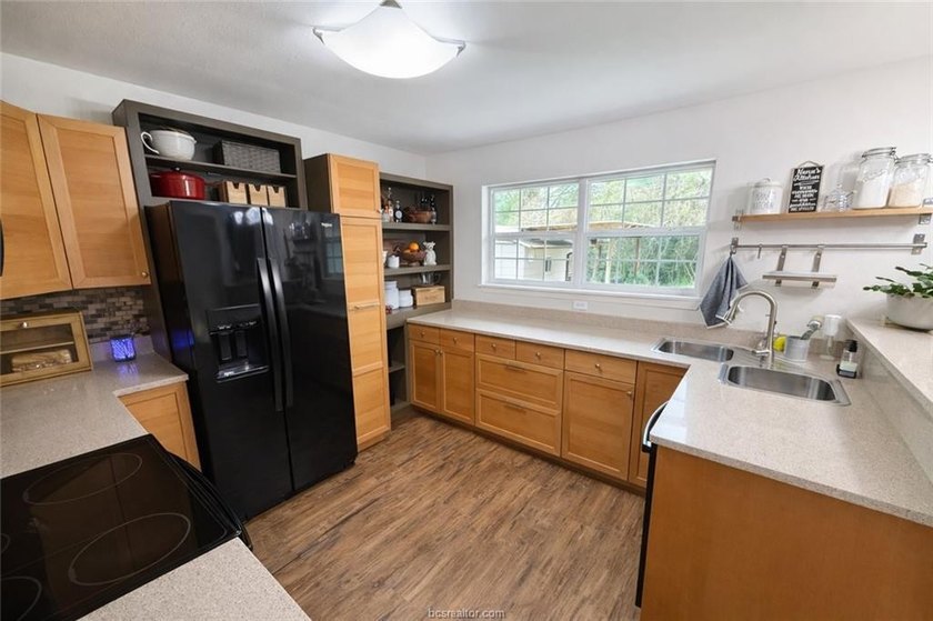Set on nearly an acre of land, this one-of-a-kind property - photo 25