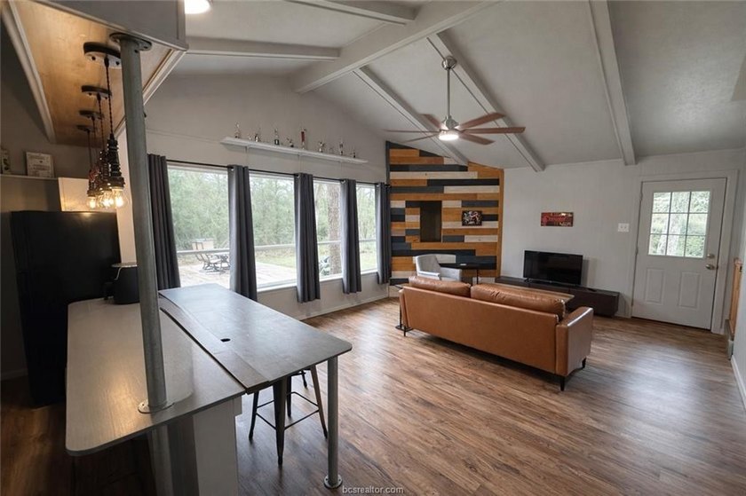 Set on nearly an acre of land, this one-of-a-kind property - photo 30