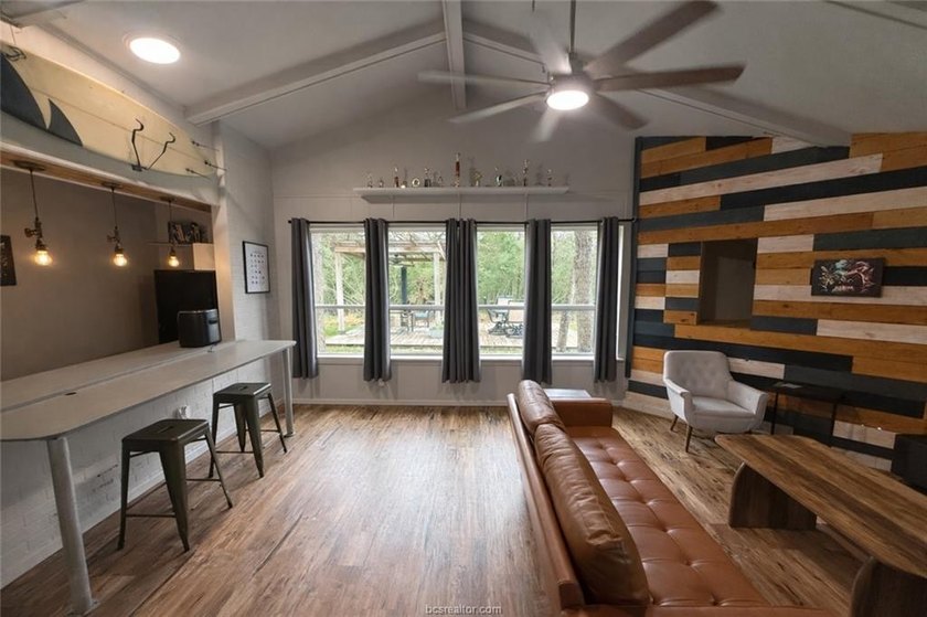 Set on nearly an acre of land, this one-of-a-kind property - photo 32