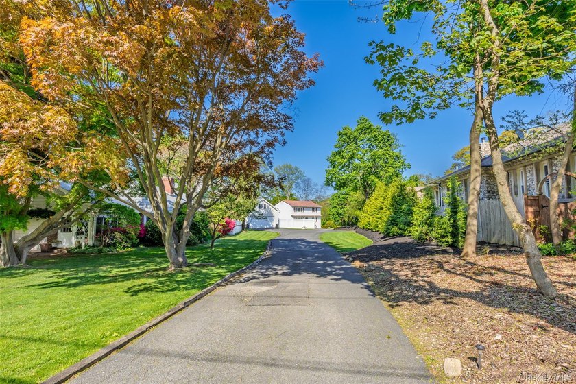 Nestled at the end of a long driveway, off Nassau Road, this - photo 45