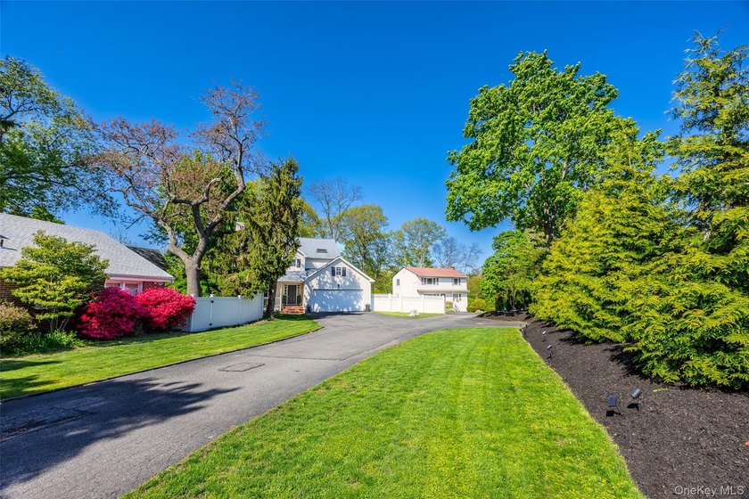 Nestled at the end of a long driveway, off Nassau Road, this - photo 47