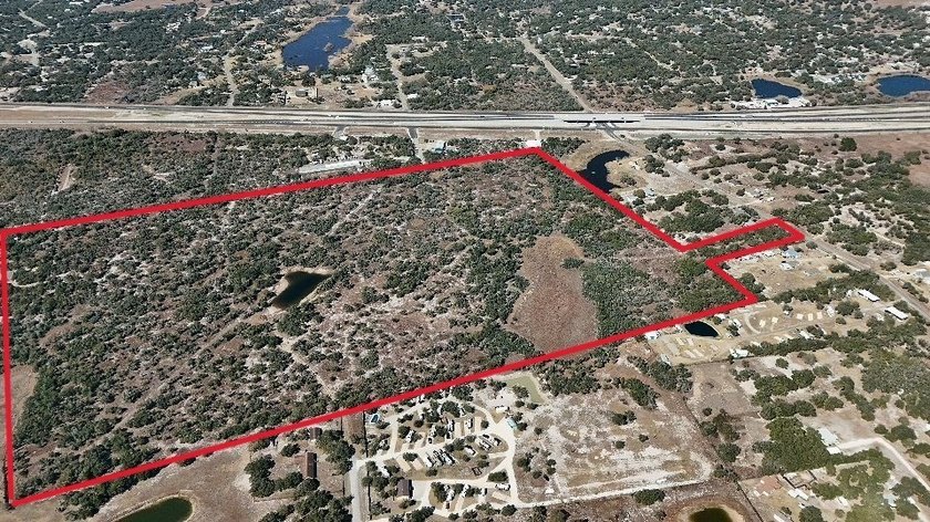 84.63 Acres close to town with 3 access points! Gated entrances - photo 17