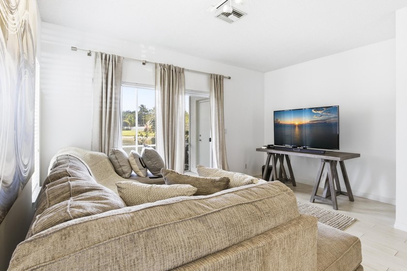 Beautiful two-story corner townhouse offering two bedrooms and - photo 12