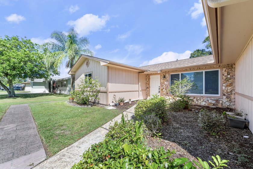 Welcome home to this beautifully cared-for 3-bedroom, 2-bath - photo 2