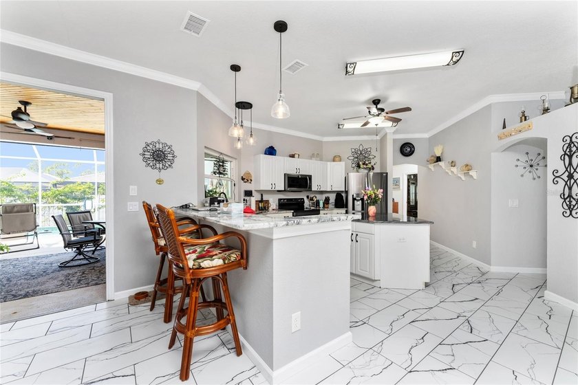 RARE DOUBLE LOT HOME!! This beautifully updated 4-bedroom - photo 12