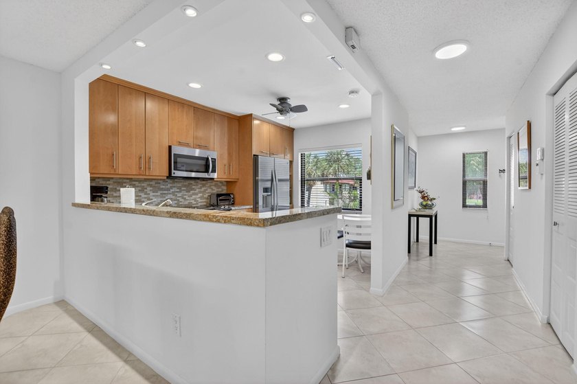 BEAUTIFUL MODERN OPEN CONCEPT KITCHEN WITH A WARM NATURAL WOOD - photo 10