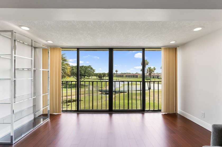 Wake up to tranquil lake and golf course views in this - photo 15