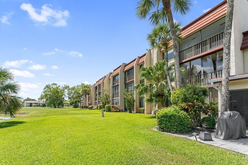 Wake up to tranquil lake and golf course views in this - photo 16