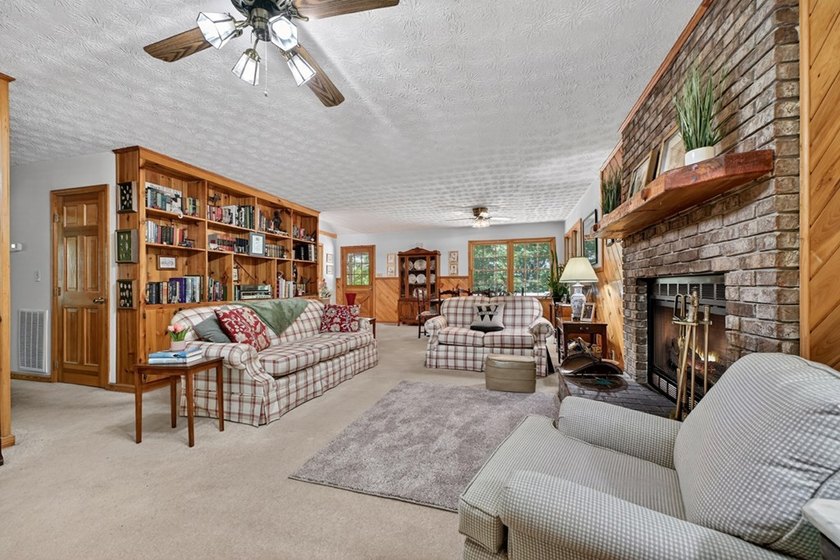 Charming cottage home nestled on nearly 7 private wooded acres - photo 3