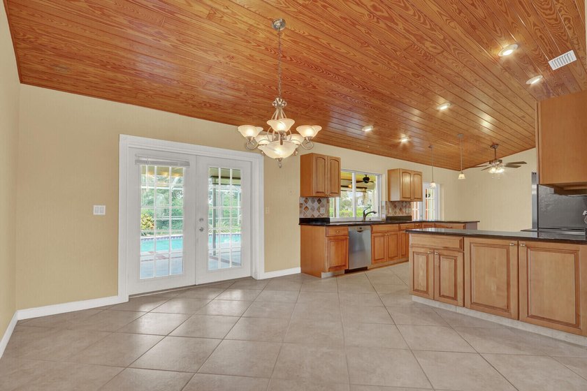 Welcome to Tequesta Country Club, where golf course living meets - photo 12
