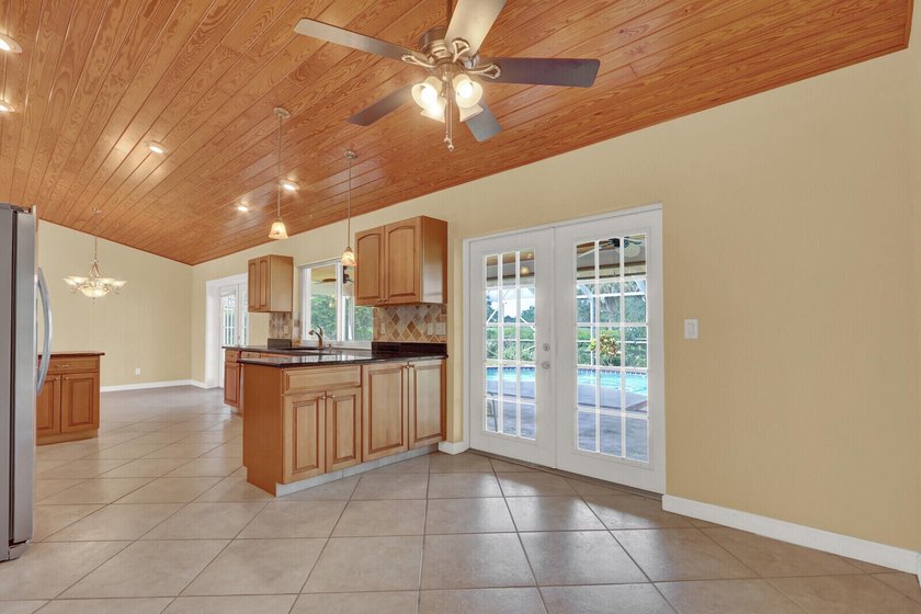 Welcome to Tequesta Country Club, where golf course living meets - photo 17