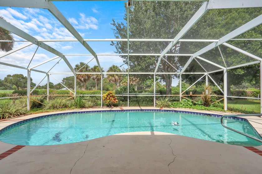 Welcome to Tequesta Country Club, where golf course living meets - photo 29