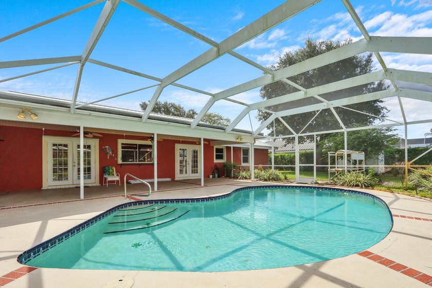 Welcome to Tequesta Country Club, where golf course living meets - photo 30