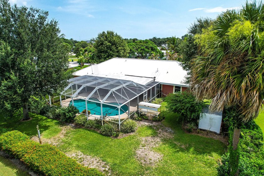 Welcome to Tequesta Country Club, where golf course living meets - photo 36