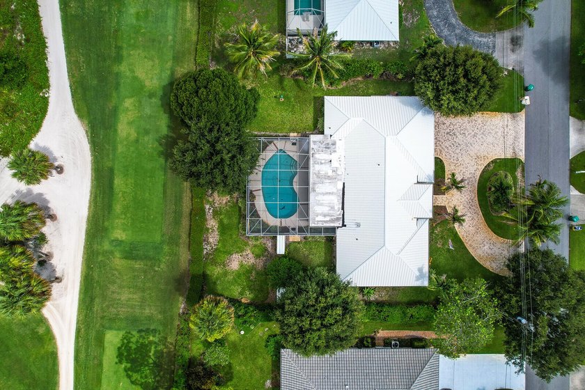 Welcome to Tequesta Country Club, where golf course living meets - photo 37