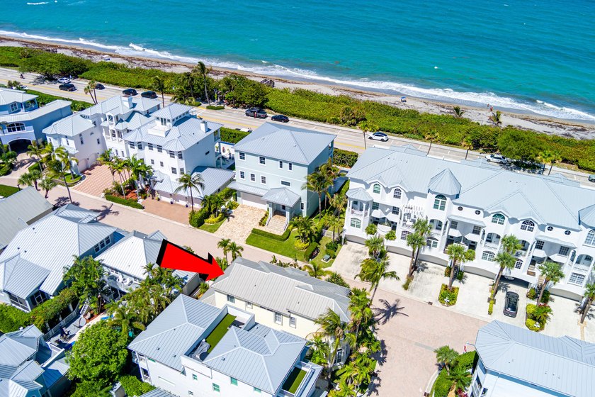 Located in the gated Jupiter Key community just steps from the - photo 2