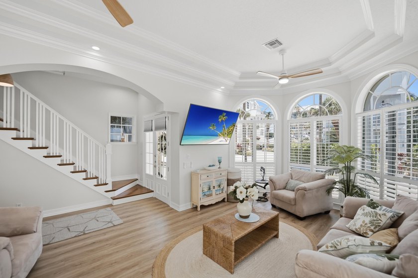 Located in the gated Jupiter Key community just steps from the - photo 4