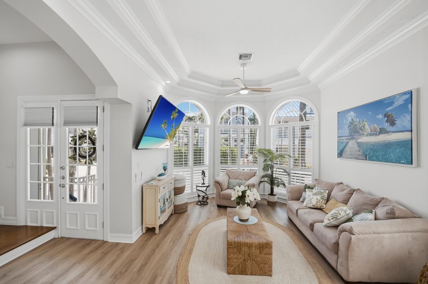 Located in the gated Jupiter Key community just steps from the - photo 5