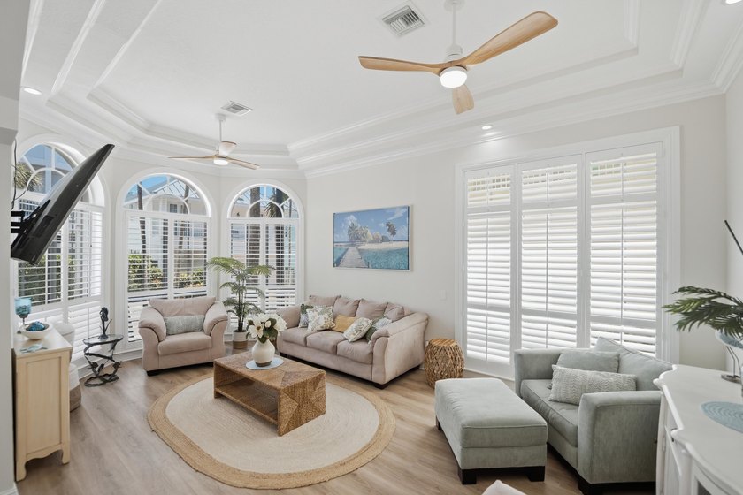 Located in the gated Jupiter Key community just steps from the - photo 7