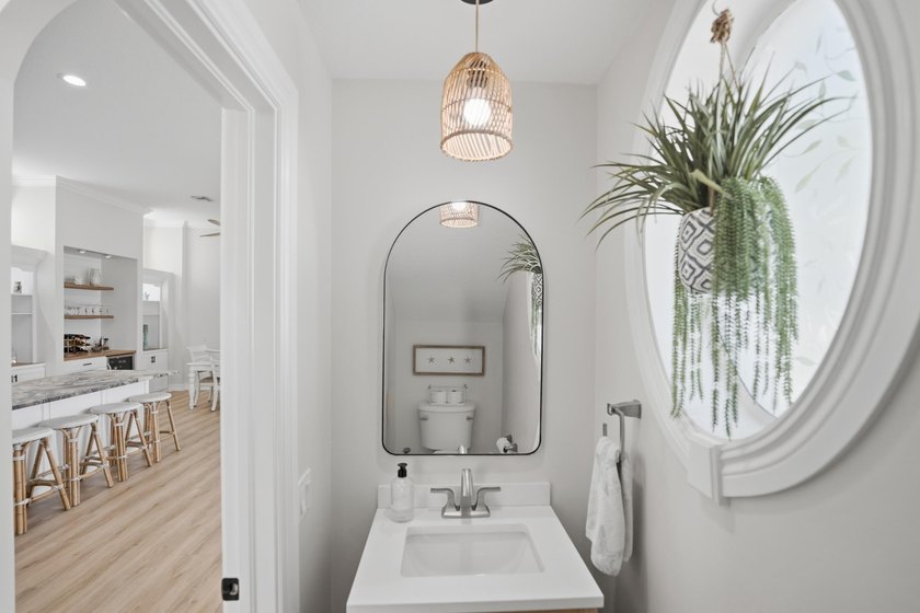 Located in the gated Jupiter Key community just steps from the - photo 9