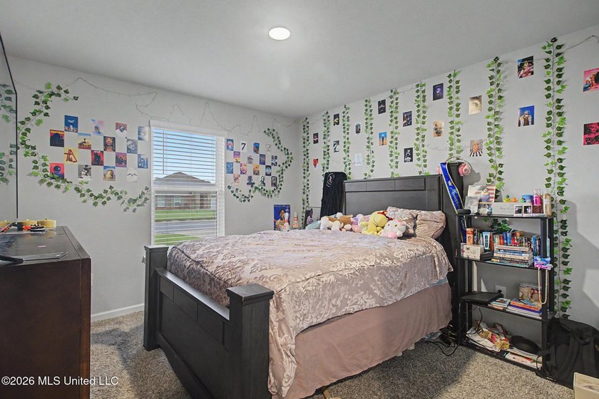 Welcome home to this spacious 4-bedroom, 2-bath property - photo 11