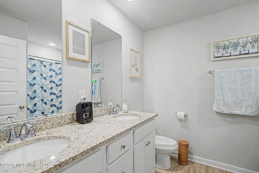 Welcome home to this spacious 4-bedroom, 2-bath property - photo 12