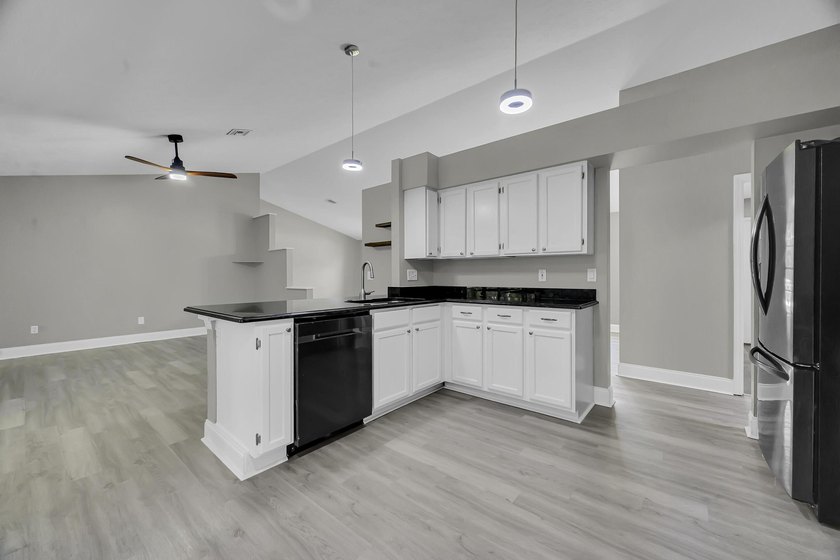 Welcome to this charming 3/2/2 home located on an oversized - photo 12