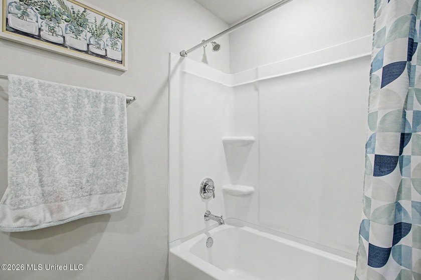 Welcome home to this spacious 4-bedroom, 2-bath property - photo 13