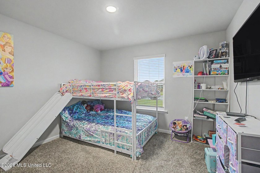 Welcome home to this spacious 4-bedroom, 2-bath property - photo 15