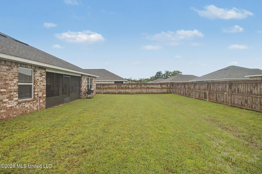 Welcome home to this spacious 4-bedroom, 2-bath property - photo 17