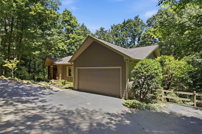 Just three minutes from Big Canoe's North Gate and located in - photo 3