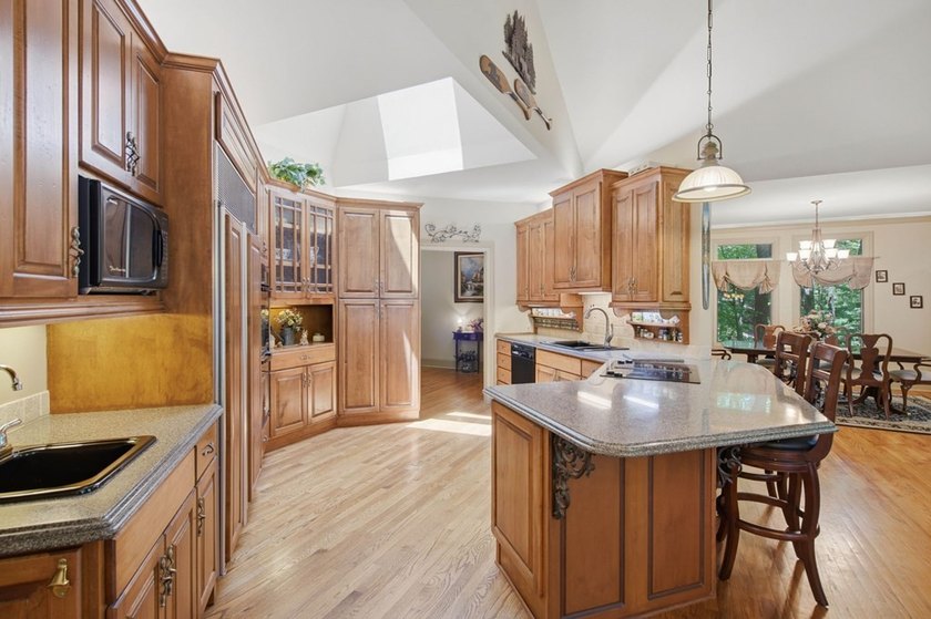 Just three minutes from Big Canoe's North Gate and located in - photo 10