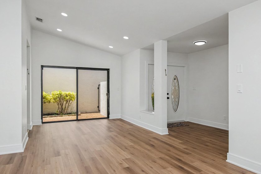 This beautifully updated 3-bedroom, 2-bathroom residence offers - photo 12