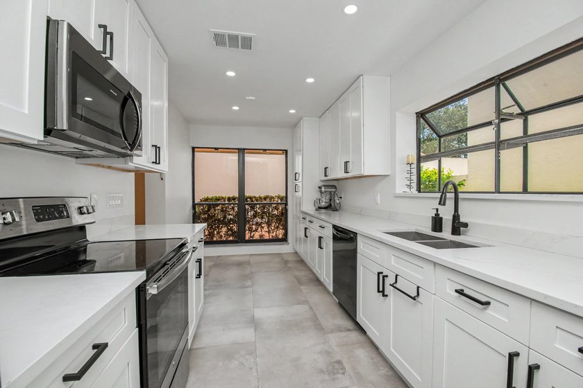 This beautifully updated 3-bedroom, 2-bathroom residence offers - photo 16