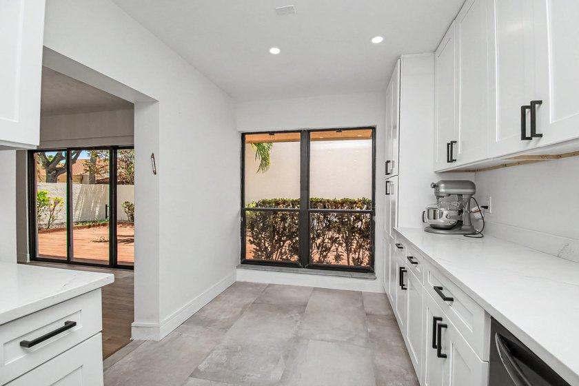 This beautifully updated 3-bedroom, 2-bathroom residence offers - photo 18